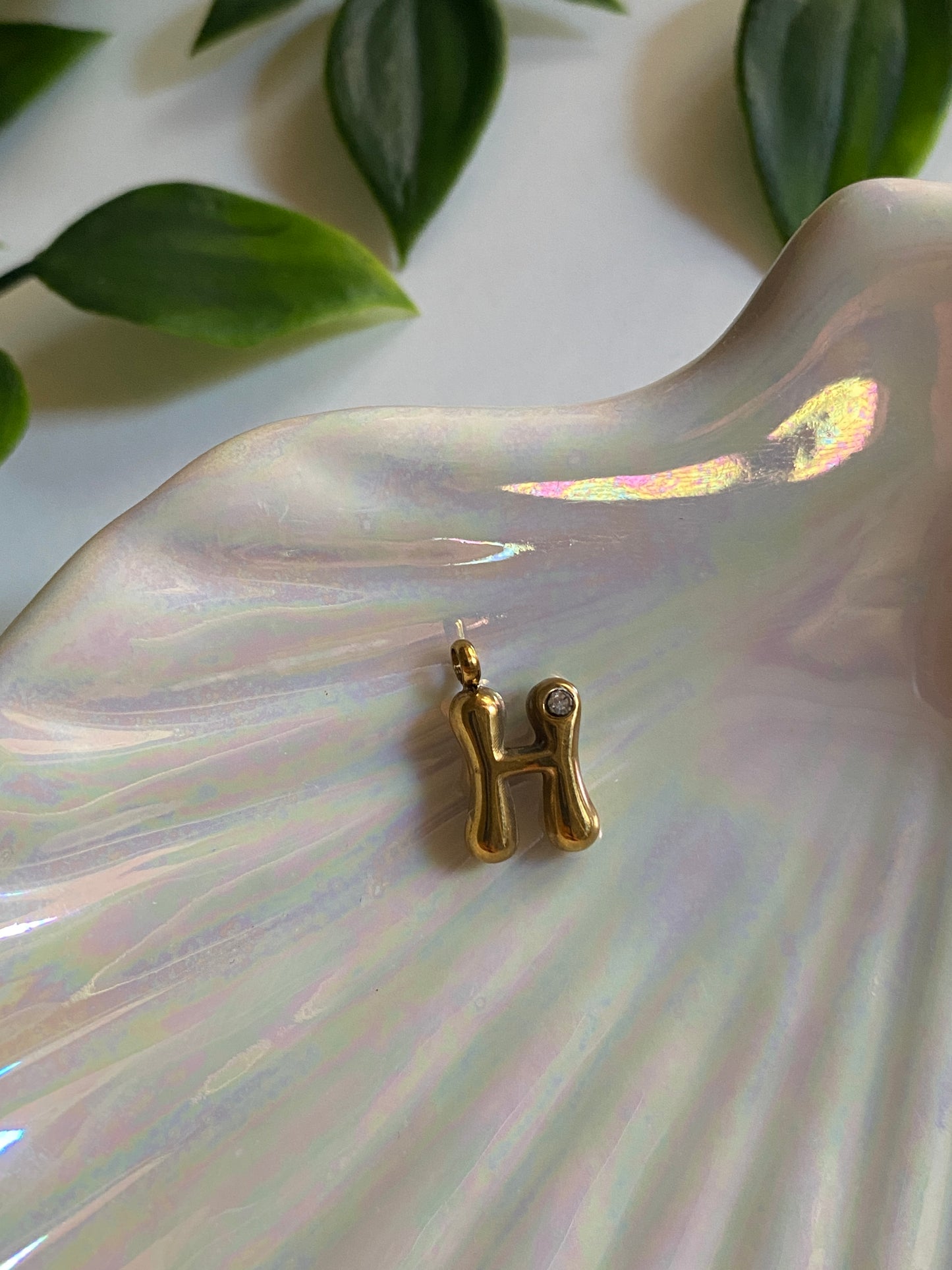 H Initial Charm