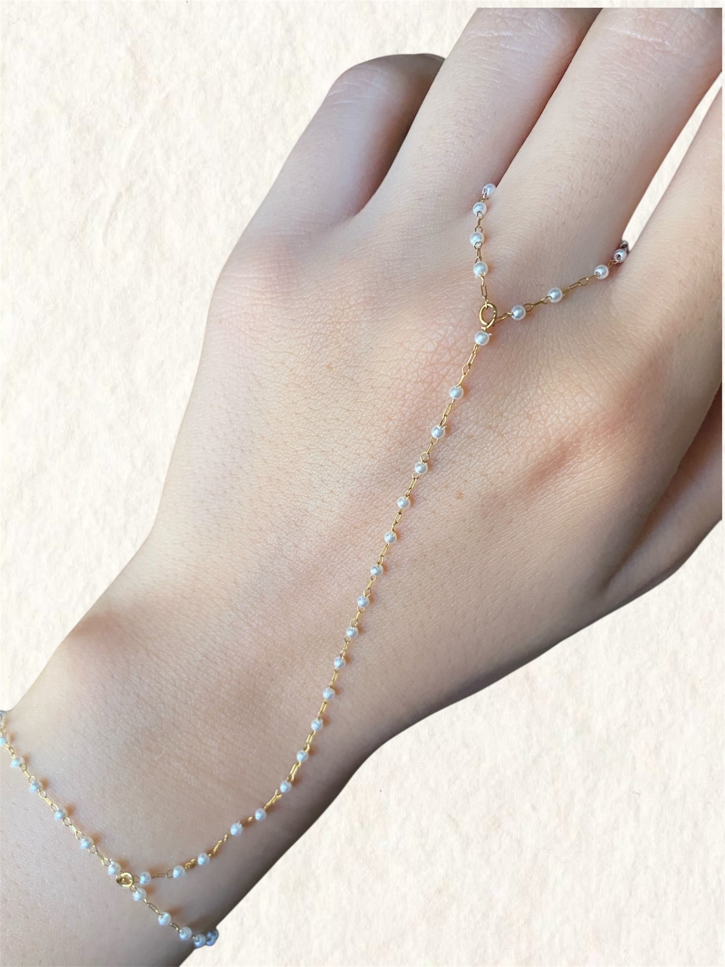 Pearl thread hand chain