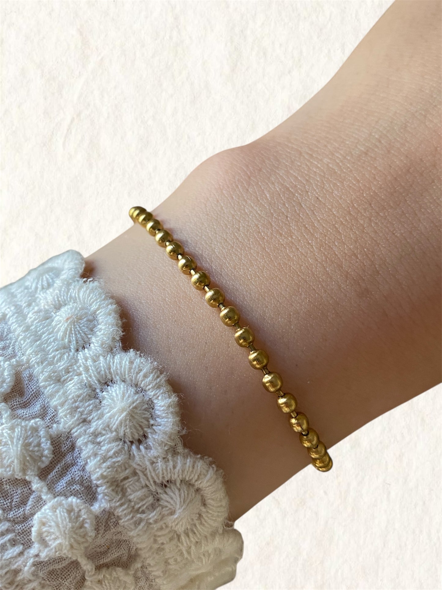 Golden orbit bracelet