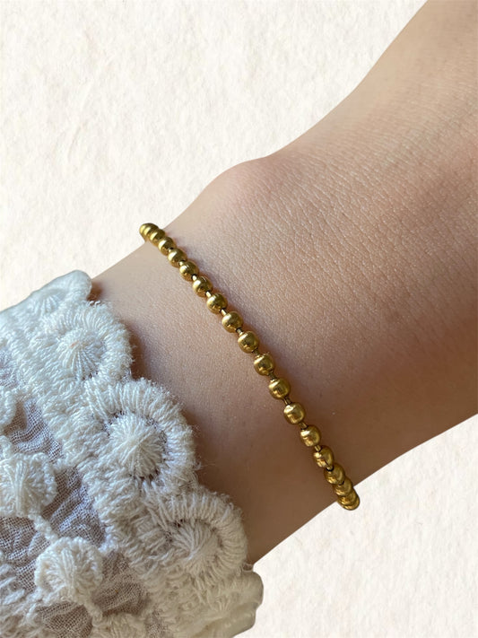 Golden orbit bracelet