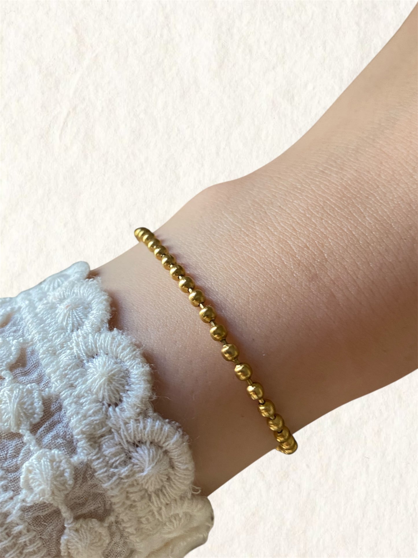 Golden orbit bracelet
