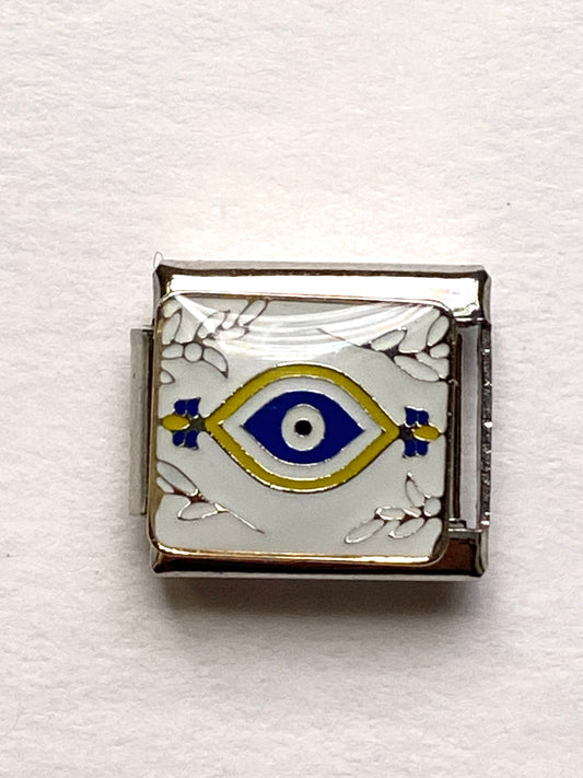 White evil eye charm